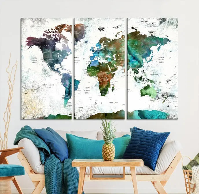 A Push Pin World Map Wall Art Canvas Print, featuring watercolor hues and enhanced with a UV-protective coating for long-lasting vibrant colors, hangs prominently.