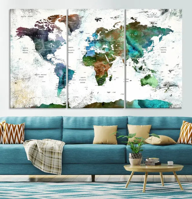 A Push Pin World Map Wall Art Canvas Print, featuring watercolor hues and enhanced with a UV-protective coating for long-lasting vibrant colors, hangs prominently.