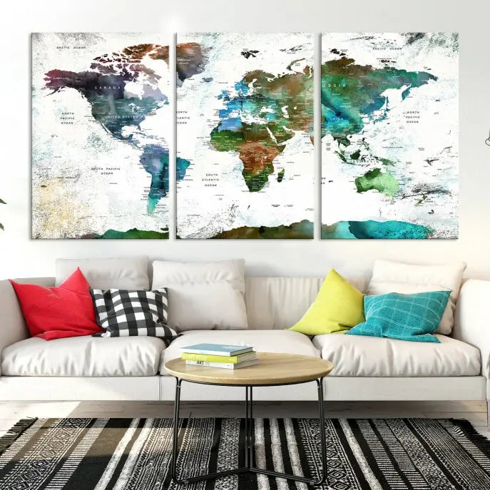 A Push Pin World Map Wall Art Canvas Print, featuring watercolor hues and enhanced with a UV-protective coating for long-lasting vibrant colors, hangs prominently.