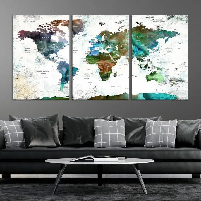 A Push Pin World Map Wall Art Canvas Print, featuring watercolor hues and enhanced with a UV-protective coating for long-lasting vibrant colors, hangs prominently.