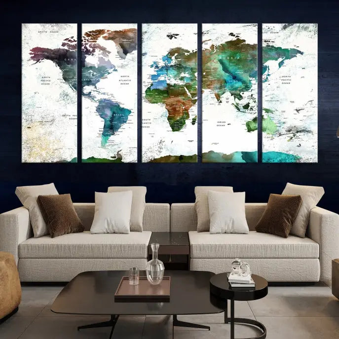 A Push Pin World Map Wall Art Canvas Print, featuring watercolor hues and enhanced with a UV-protective coating for long-lasting vibrant colors, hangs prominently.