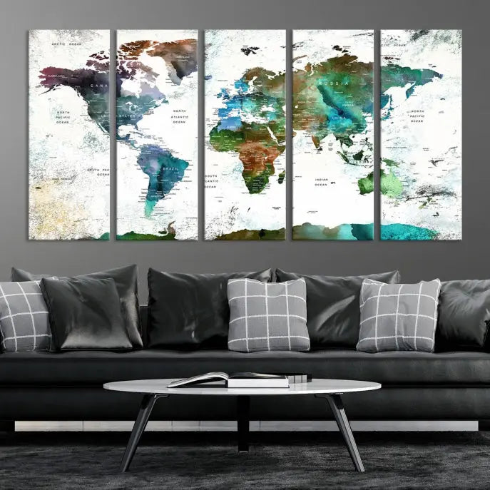 A Push Pin World Map Wall Art Canvas Print, featuring watercolor hues and enhanced with a UV-protective coating for long-lasting vibrant colors, hangs prominently.