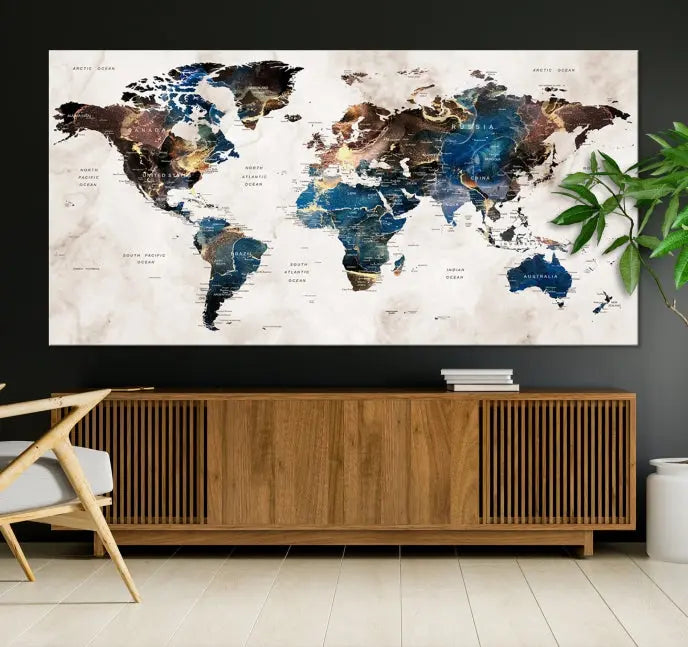 A vibrant Push Pin World Map Wall Art Watercolor Painting Canvas Print, expertly hand-assembled with museum-quality polycotton and UV-protective coating, is displayed in a modern living room.