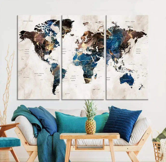 A vibrant Push Pin World Map Wall Art Watercolor Painting Canvas Print, expertly hand-assembled with museum-quality polycotton and UV-protective coating, is displayed in a modern living room.