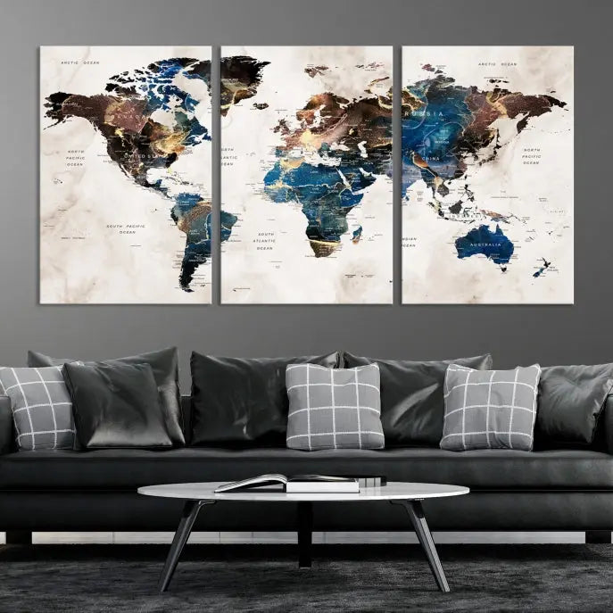 A vibrant Push Pin World Map Wall Art Watercolor Painting Canvas Print, expertly hand-assembled with museum-quality polycotton and UV-protective coating, is displayed in a modern living room.