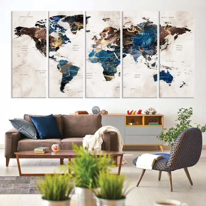 A vibrant Push Pin World Map Wall Art Watercolor Painting Canvas Print, expertly hand-assembled with museum-quality polycotton and UV-protective coating, is displayed in a modern living room.