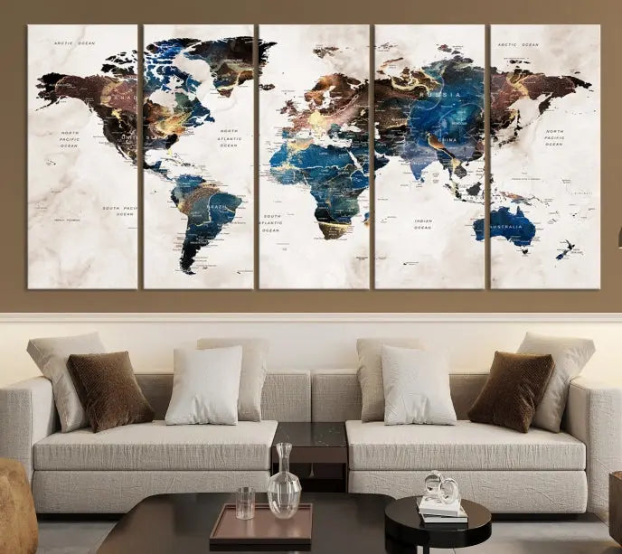 A vibrant Push Pin World Map Wall Art Watercolor Painting Canvas Print, expertly hand-assembled with museum-quality polycotton and UV-protective coating, is displayed in a modern living room.