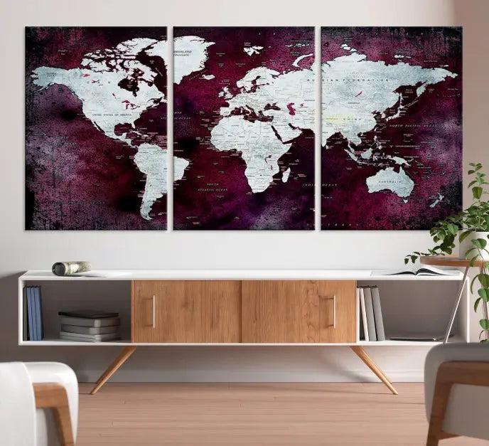 The Push Pin World Map Wall Art, featuring a sophisticated design on a purple background, is expertly crafted on gallery-wrapped canvas.