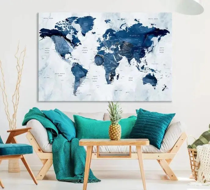 A Push Pin World Map Watercolor Wall Art Canvas Print in shades of blue and white is displayed.