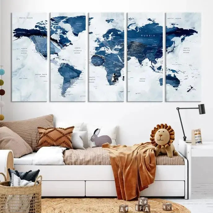 A Push Pin World Map Watercolor Wall Art Canvas Print in shades of blue and white is displayed.