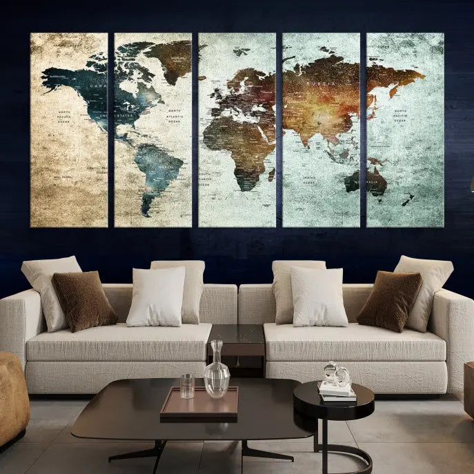 The modern living room features the museum-quality "Push Pin World Map Watercolor Wall Art Canvas Print" adorning the dark wall.