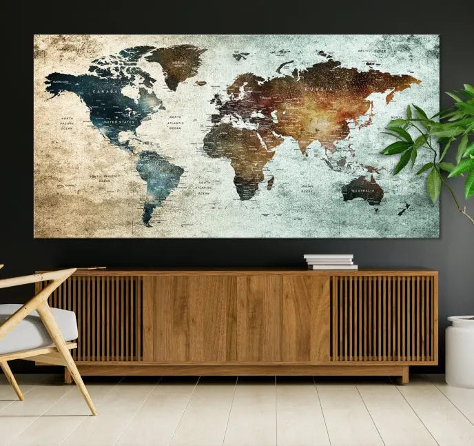 The modern living room features the museum-quality "Push Pin World Map Watercolor Wall Art Canvas Print" adorning the dark wall.