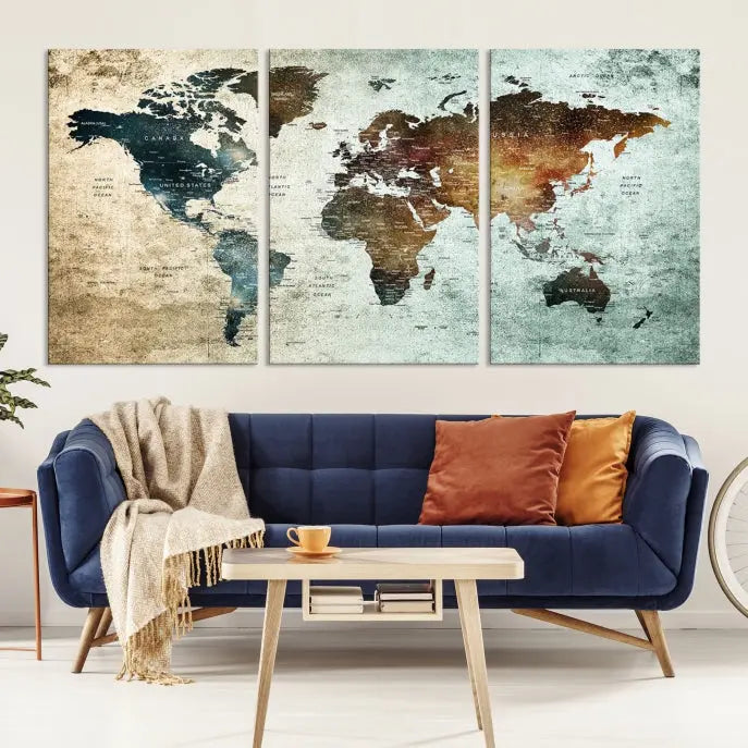 The modern living room features the museum-quality "Push Pin World Map Watercolor Wall Art Canvas Print" adorning the dark wall.