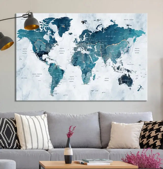 The Push Pin World Map Watercolor Wall Art Canvas Print, designed in soothing shades of blue and printed on museum-quality canvas with a UV-protective coating, elegantly hangs as a stunning piece. Enjoy free shipping on this artwork.