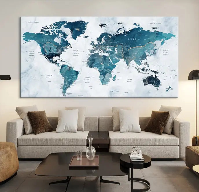 The Push Pin World Map Watercolor Wall Art Canvas Print, designed in soothing shades of blue and printed on museum-quality canvas with a UV-protective coating, elegantly hangs as a stunning piece. Enjoy free shipping on this artwork.