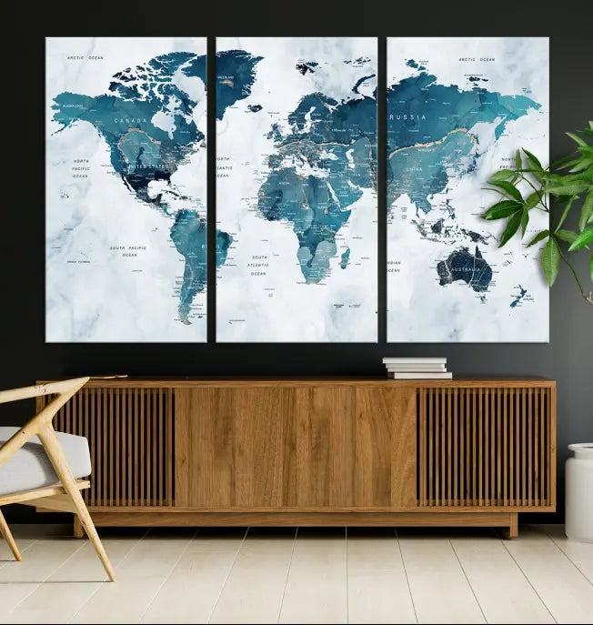 The Push Pin World Map Watercolor Wall Art Canvas Print, designed in soothing shades of blue and printed on museum-quality canvas with a UV-protective coating, elegantly hangs as a stunning piece. Enjoy free shipping on this artwork.