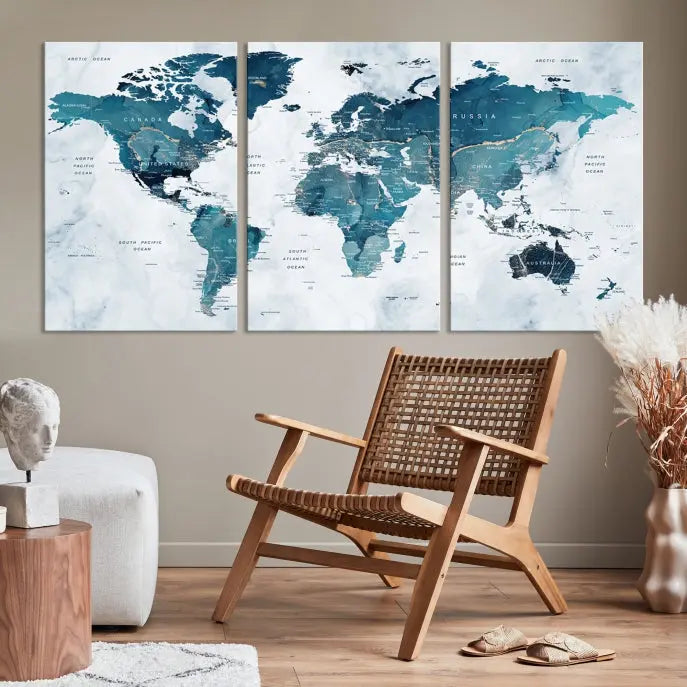 The Push Pin World Map Watercolor Wall Art Canvas Print, designed in soothing shades of blue and printed on museum-quality canvas with a UV-protective coating, elegantly hangs as a stunning piece. Enjoy free shipping on this artwork.