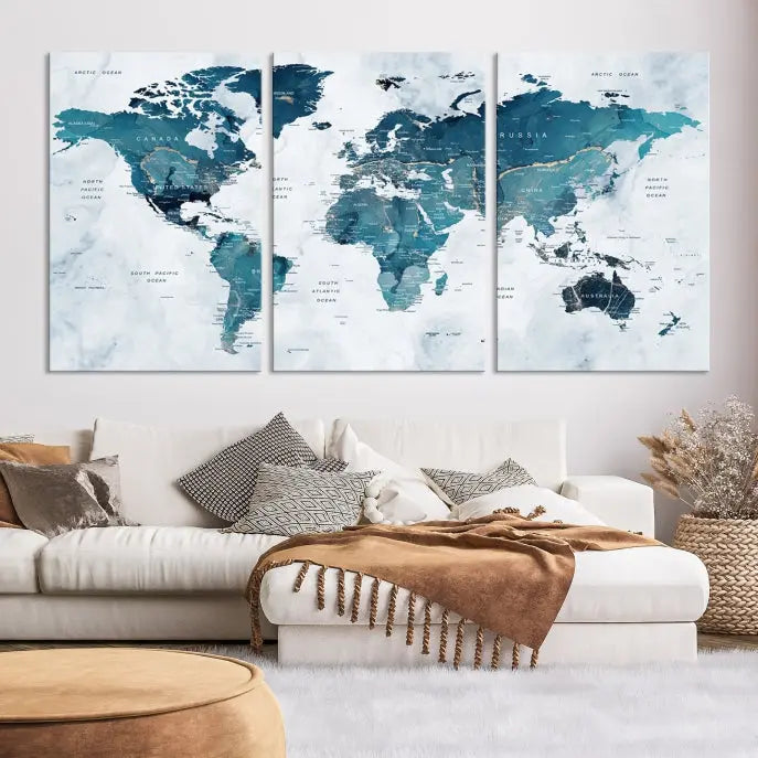 The Push Pin World Map Watercolor Wall Art Canvas Print, designed in soothing shades of blue and printed on museum-quality canvas with a UV-protective coating, elegantly hangs as a stunning piece. Enjoy free shipping on this artwork.