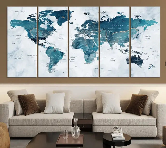 The Push Pin World Map Watercolor Wall Art Canvas Print, designed in soothing shades of blue and printed on museum-quality canvas with a UV-protective coating, elegantly hangs as a stunning piece. Enjoy free shipping on this artwork.