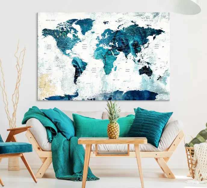 A modern living room showcases a Push Pin World Map with Antarctica, elegantly displayed on museum-quality canvas.