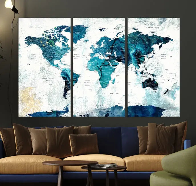 A modern living room showcases a Push Pin World Map with Antarctica, elegantly displayed on museum-quality canvas.