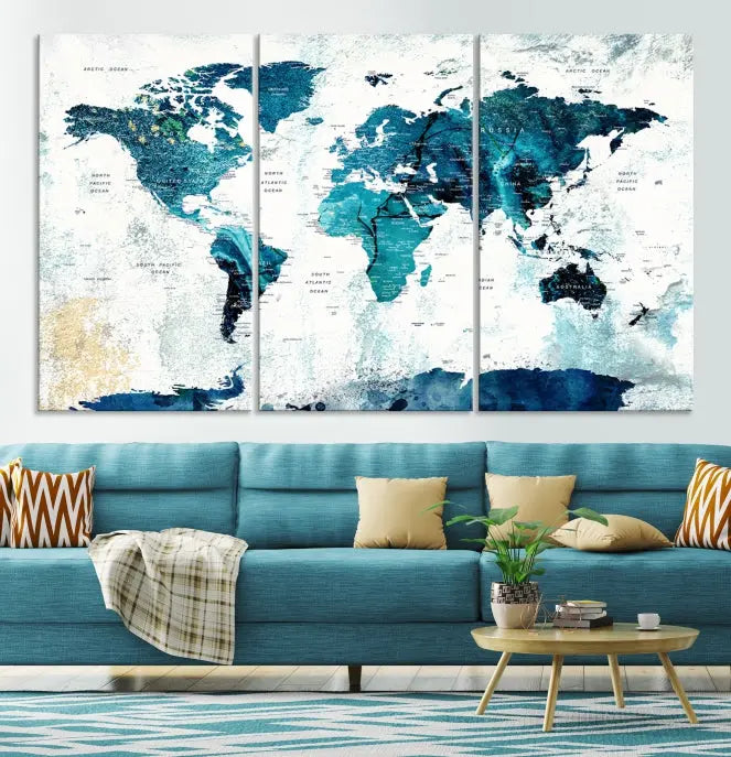 A modern living room showcases a Push Pin World Map with Antarctica, elegantly displayed on museum-quality canvas.