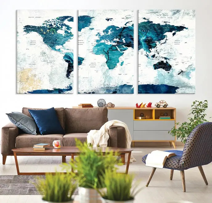 A modern living room showcases a Push Pin World Map with Antarctica, elegantly displayed on museum-quality canvas.