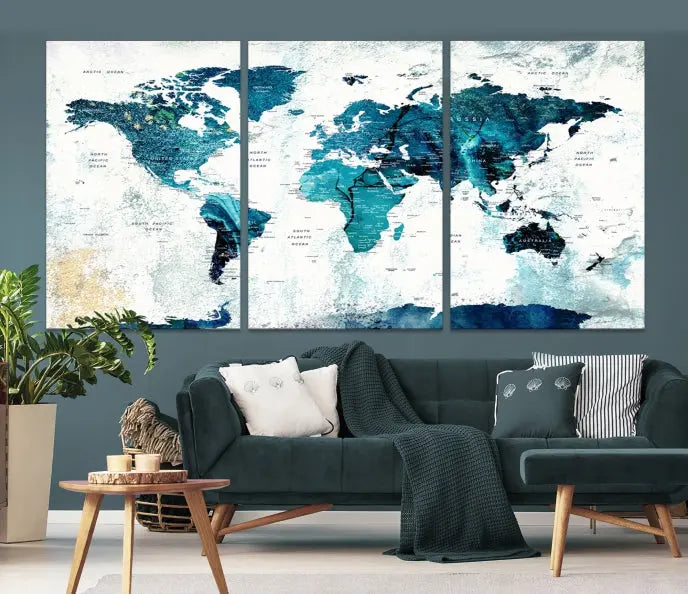 A modern living room showcases a Push Pin World Map with Antarctica, elegantly displayed on museum-quality canvas.