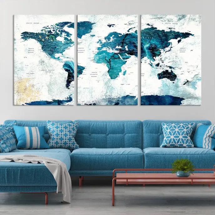 A modern living room showcases a Push Pin World Map with Antarctica, elegantly displayed on museum-quality canvas.