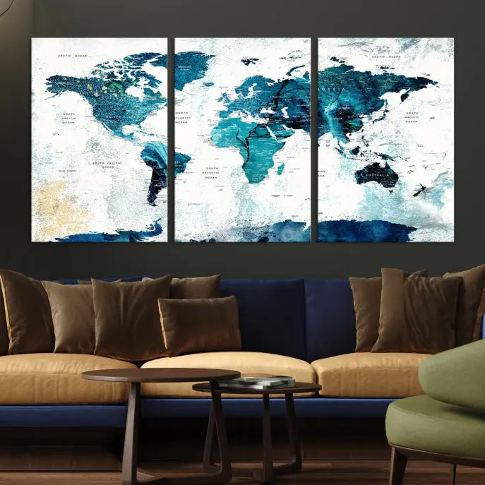 A modern living room showcases a Push Pin World Map with Antarctica, elegantly displayed on museum-quality canvas.