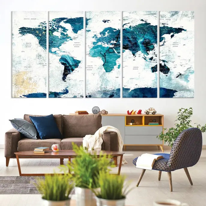 A modern living room showcases a Push Pin World Map with Antarctica, elegantly displayed on museum-quality canvas.