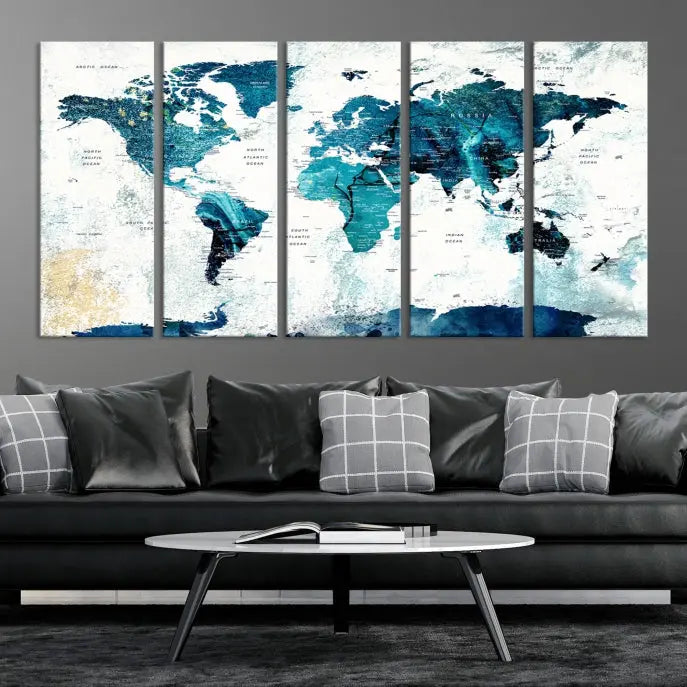 A modern living room showcases a Push Pin World Map with Antarctica, elegantly displayed on museum-quality canvas.