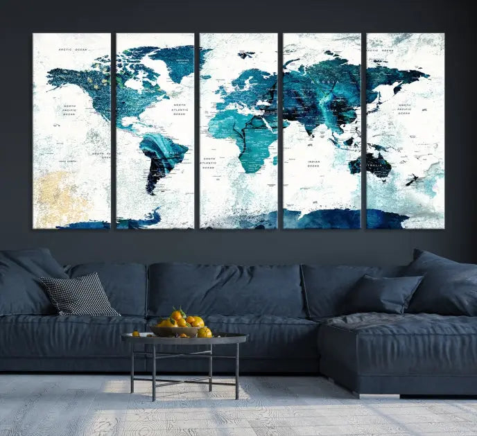 A modern living room showcases a Push Pin World Map with Antarctica, elegantly displayed on museum-quality canvas.