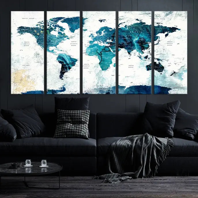 A modern living room showcases a Push Pin World Map with Antarctica, elegantly displayed on museum-quality canvas.