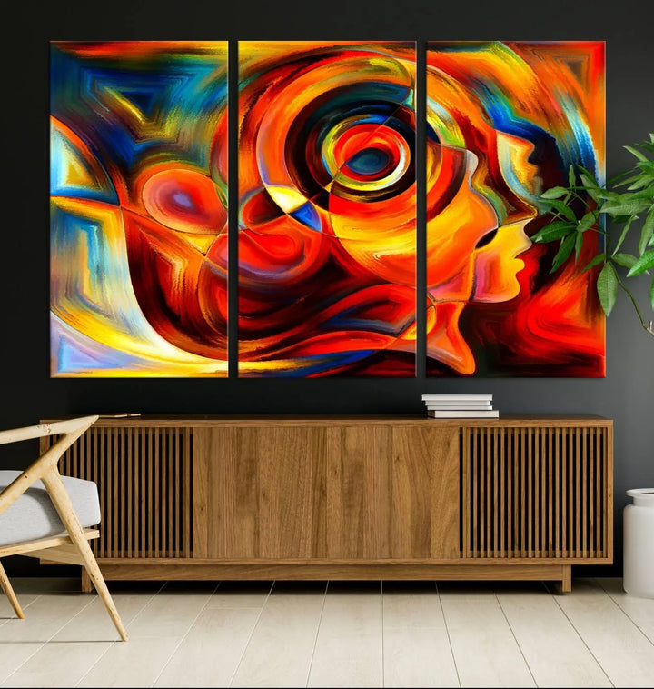 The "Radiant Colors Human Figures" wall art canvas print enhances the space with its vibrant abstract panels, showcasing swirling colors and dynamic shapes. The gallery-wrapped artwork is crafted from museum-quality polycotton and features a UV-protective coating, ensuring lasting beauty and elegance.