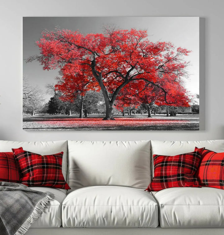 The triptych art of a Red Autumn Tree features vibrant red leaves contrasted against a black and white background, beautifully presented on museum-quality canvas from the "Red Autumn Tree Canvas Wall Art Print Autumn Art Black and White Nature Photo Art Tree" collection.