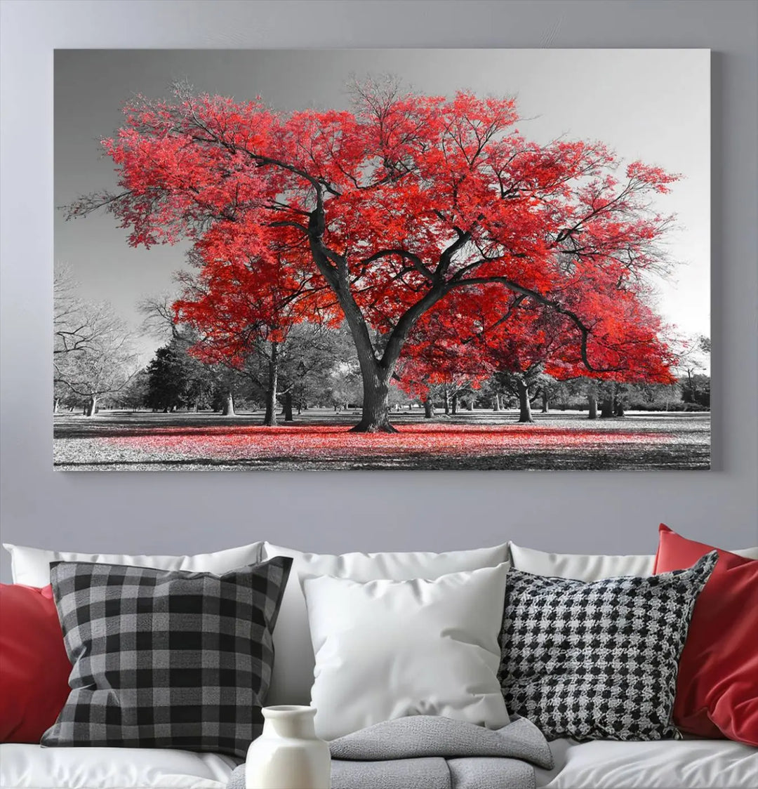 The triptych art of a Red Autumn Tree features vibrant red leaves contrasted against a black and white background, beautifully presented on museum-quality canvas from the "Red Autumn Tree Canvas Wall Art Print Autumn Art Black and White Nature Photo Art Tree" collection.