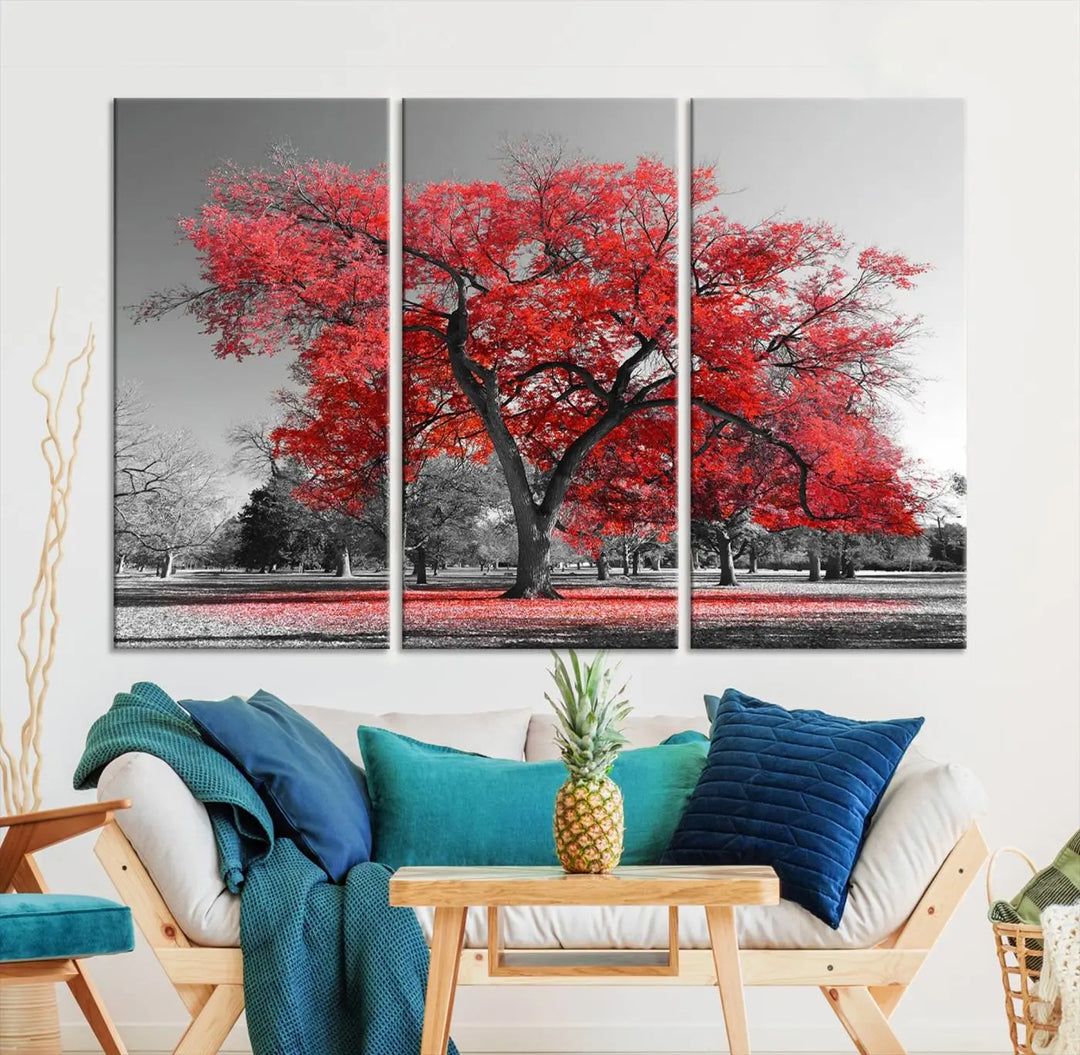 The triptych art of a Red Autumn Tree features vibrant red leaves contrasted against a black and white background, beautifully presented on museum-quality canvas from the "Red Autumn Tree Canvas Wall Art Print Autumn Art Black and White Nature Photo Art Tree" collection.