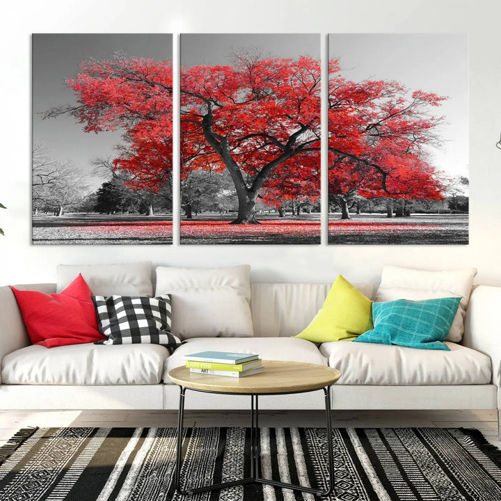 The triptych art of a Red Autumn Tree features vibrant red leaves contrasted against a black and white background, beautifully presented on museum-quality canvas from the "Red Autumn Tree Canvas Wall Art Print Autumn Art Black and White Nature Photo Art Tree" collection.