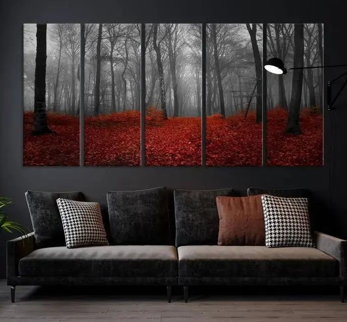 The Red Forest Floor Canvas Wall Art, a mystical foggy woodland triptych, is elegantly displayed on the wall. This nature-inspired decor transforms your space into an enchanting retreat.