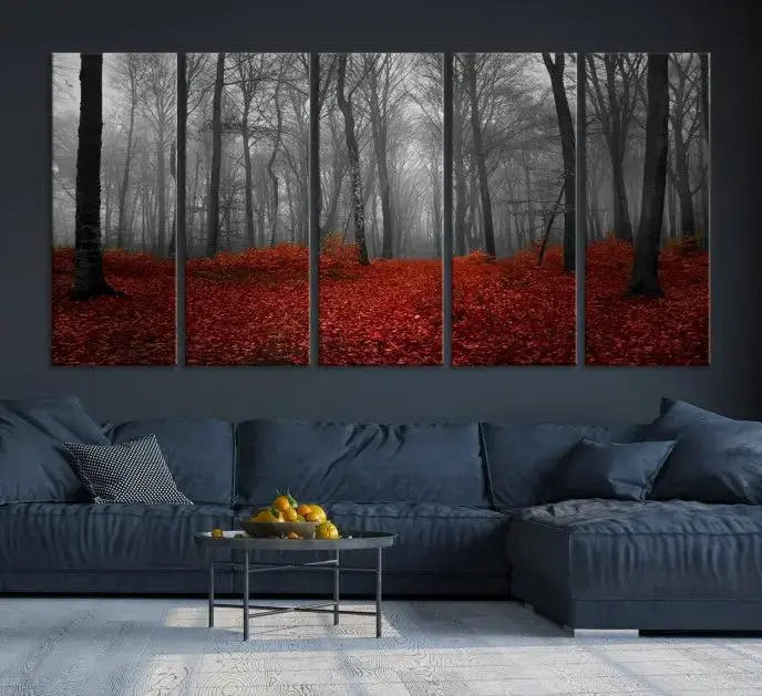 The Red Forest Floor Canvas Wall Art, a mystical foggy woodland triptych, is elegantly displayed on the wall. This nature-inspired decor transforms your space into an enchanting retreat.