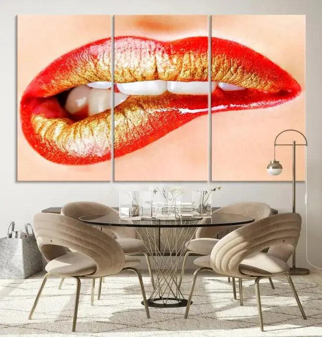 The Red Lip Bite Canvas Print, featuring a triptych of lips with red and gold lipstick, is elegantly displayed, enhancing the modern aesthetic of the minimalist room decor. This artwork is printed on high-quality polycotton canvas.