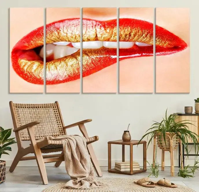 The Red Lip Bite Canvas Print, featuring a triptych of lips with red and gold lipstick, is elegantly displayed, enhancing the modern aesthetic of the minimalist room decor. This artwork is printed on high-quality polycotton canvas.