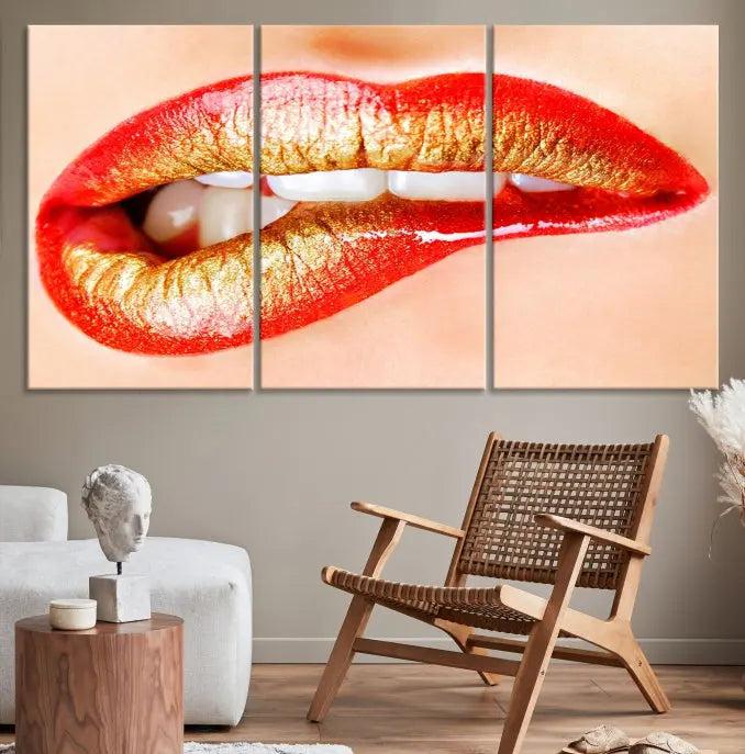 The Red Lip Bite Canvas Print, featuring a triptych of lips with red and gold lipstick, is elegantly displayed, enhancing the modern aesthetic of the minimalist room decor. This artwork is printed on high-quality polycotton canvas.