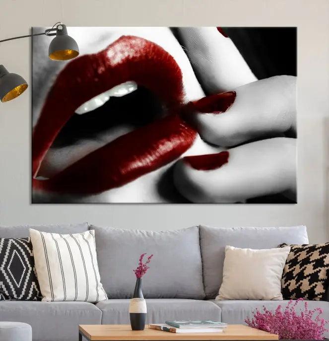 The wall features a black and white photo titled "Red Lips and Women Canvas Print," adding a touch of bold elegance to the room's contemporary art collection.