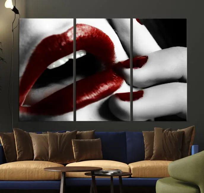 The wall features a black and white photo titled "Red Lips and Women Canvas Print," adding a touch of bold elegance to the room's contemporary art collection.