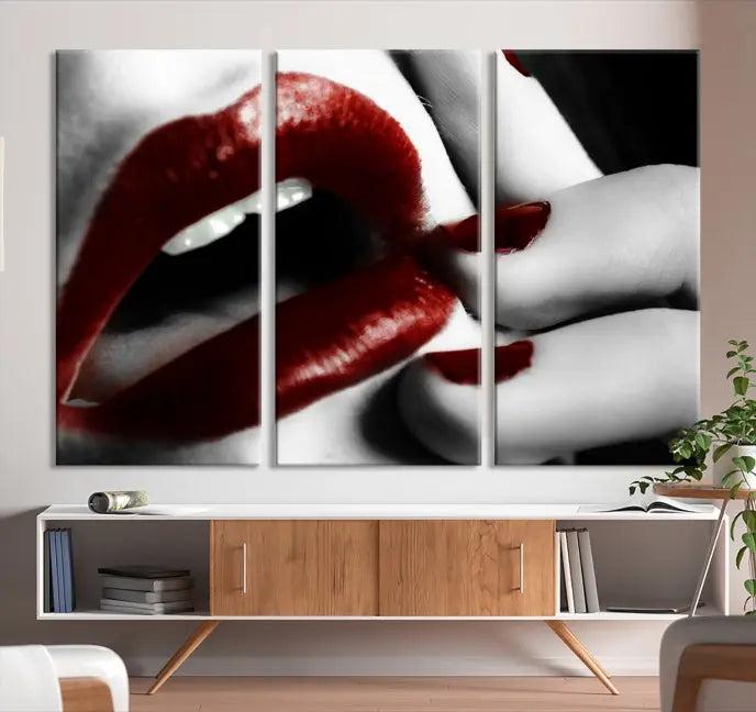 The wall features a black and white photo titled "Red Lips and Women Canvas Print," adding a touch of bold elegance to the room's contemporary art collection.