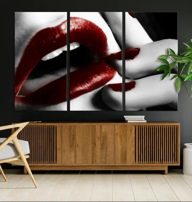 The wall features a black and white photo titled "Red Lips and Women Canvas Print," adding a touch of bold elegance to the room's contemporary art collection.