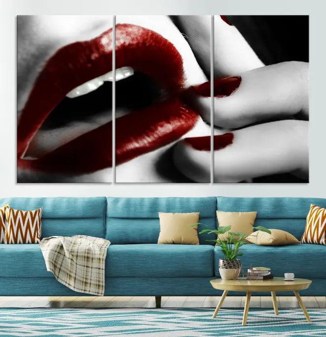 The wall features a black and white photo titled "Red Lips and Women Canvas Print," adding a touch of bold elegance to the room's contemporary art collection.