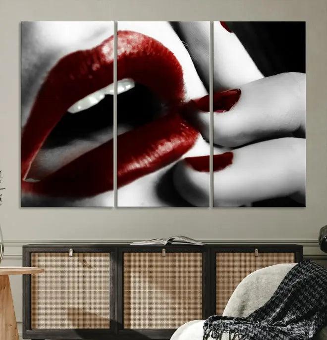 The wall features a black and white photo titled "Red Lips and Women Canvas Print," adding a touch of bold elegance to the room's contemporary art collection.